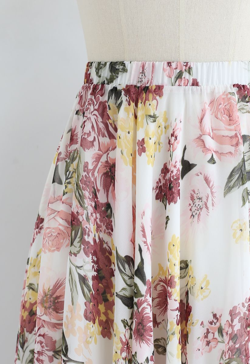 Falda larga floral de colores brillantes en crema