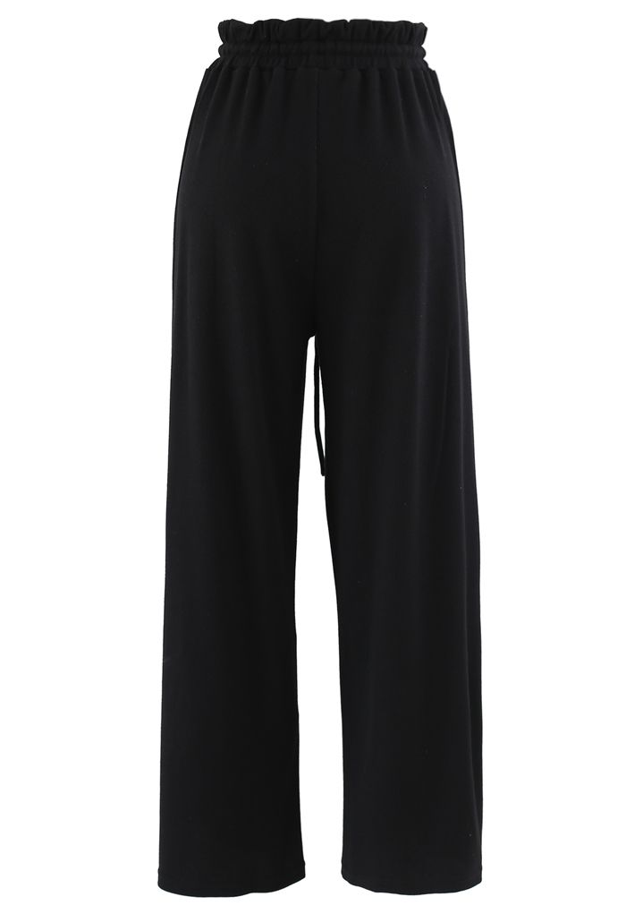 Pantalones de yoga acanalados con cintura de bolsa de papel con cordón en negro