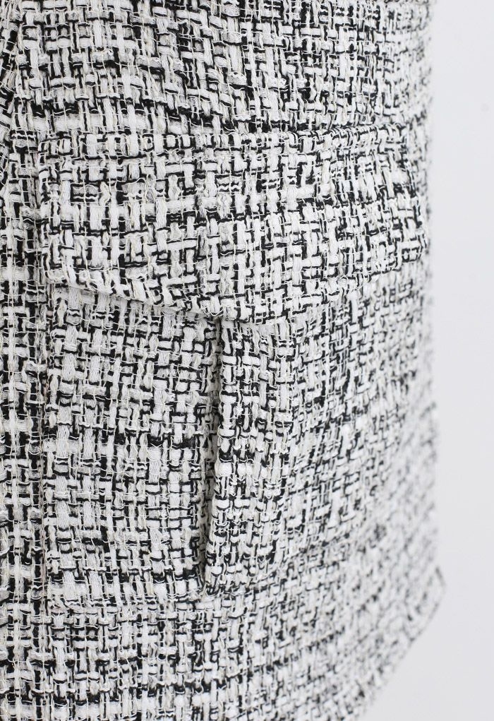 Minifalda asimétrica de tweed en negro