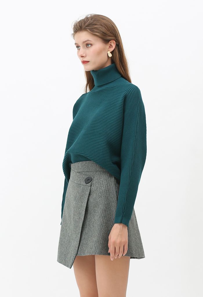 Minifalda de mezcla de lana con solapa de botones en verde oscuro