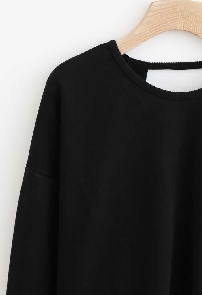 Crisscross Open Back Sweatshirt in Black