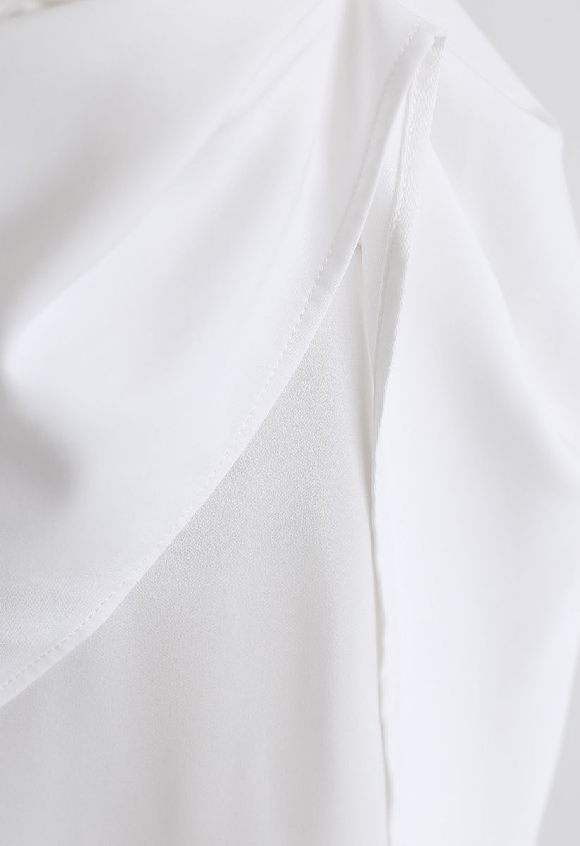 Vestido sin mangas con dobladillo asimétrico en blanco