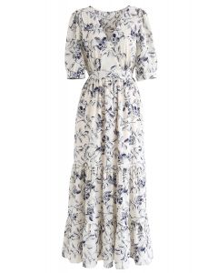 Vestido cruzado con volante floral azul marino