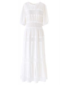 Vestido largo blanco con inserciones de encaje