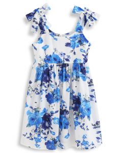 Vestido a media pierna con estampado floral y lazada en los hombros para niños