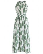 Vestido largo con cuello halter y estampado de hojas de palma de verano en verde