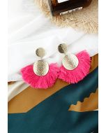Aretes redondos con flecos dorados en magenta